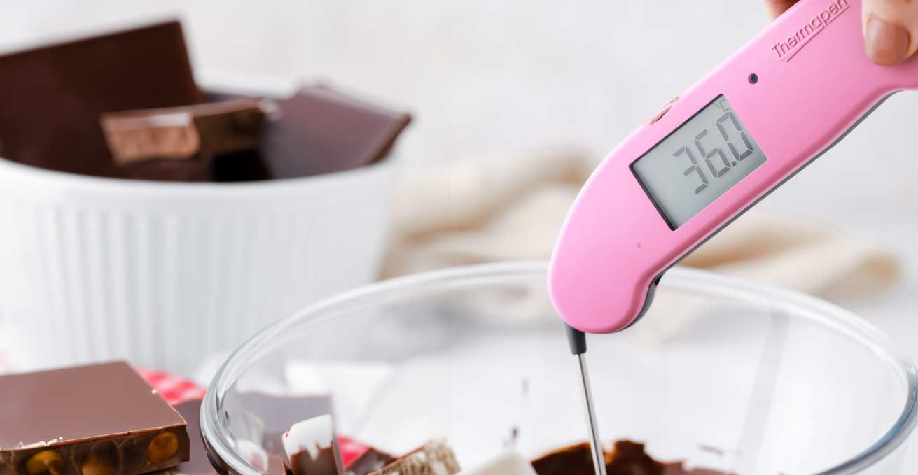 Thermapen ONE in Pink taking the temperature of melted chocolate